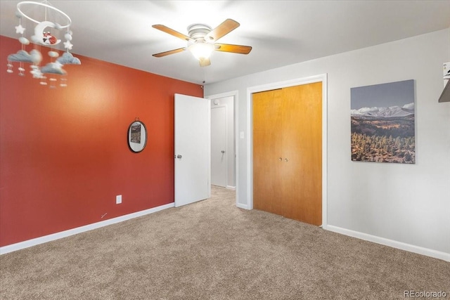 10833 W 61st Ave, Arvada, CO 80004 - unfurnished bedroom featuring carpet floors, a chandelier, and ceiling fan