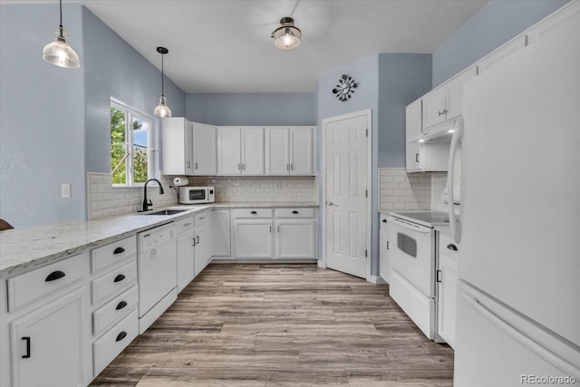 5286 Rustic Ave, Firestone, CO 80504 - kitchen with white appliances, a sink, white cabinetry, and light stone countertops