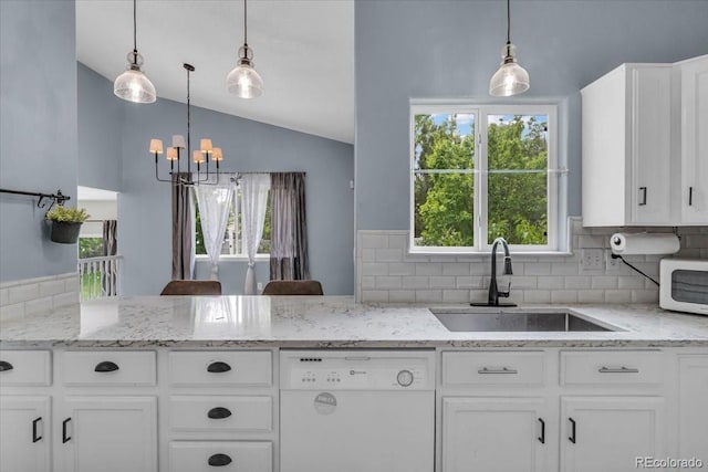 5286 Rustic Ave, Firestone, CO 80504 - kitchen featuring white appliances, a sink, lofted ceiling, a chandelier, and tasteful backsplash