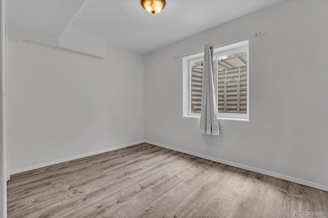 5286 Rustic Ave, Firestone, CO 80504 - unfurnished room featuring wood finished floors and baseboards