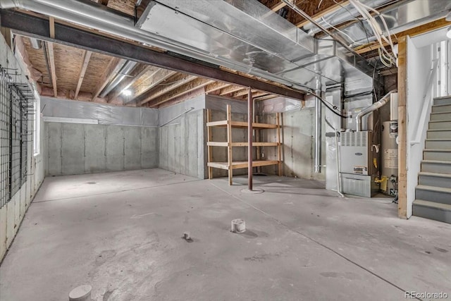 5286 Rustic Ave, Firestone, CO 80504 - unfinished basement featuring stairway, gas water heater, and heating unit