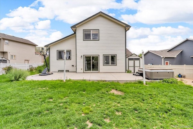5286 Rustic Ave, Firestone, CO 80504 - back of property featuring a hot tub and a patio area