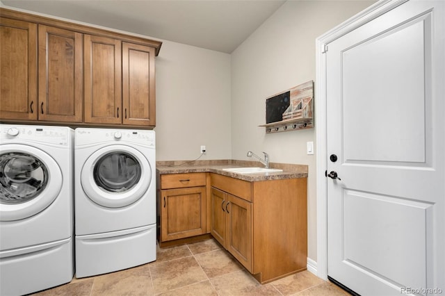 5954 Black Lion Ct, Windsor, CO 80550 - laundry room featuring cabinet space and washing machine and clothes dryer