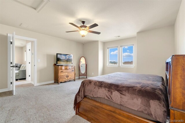 5954 Black Lion Ct, Windsor, CO 80550 - carpeted bedroom featuring baseboards, a ceiling fan, and attic access