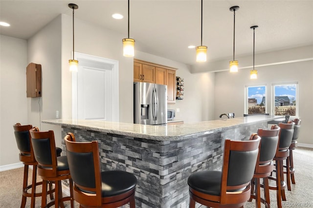 5954 Black Lion Ct, Windsor, CO 80550 - indoor wet bar with stainless steel appliances, carpet floors, baseboards, and recessed lighting