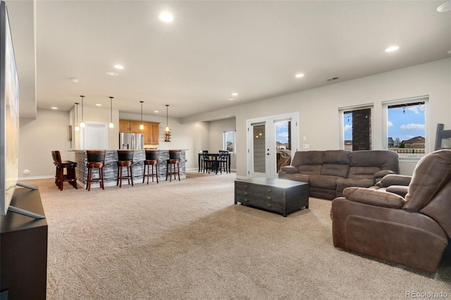 5954 Black Lion Ct, Windsor, CO 80550 - carpeted living area featuring recessed lighting and baseboards