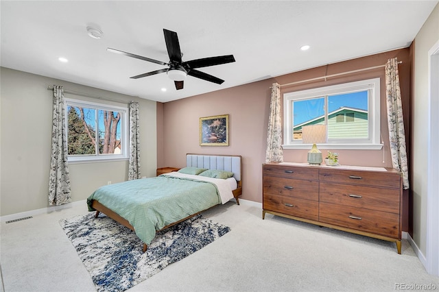 bedroom with recessed lighting, visible vents, and multiple windows