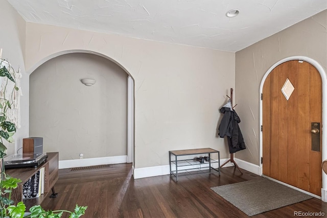 1295 S Downing St, Denver, CO 80210 - entryway featuring arched walkways and wood finished floors