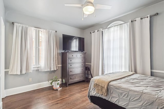 1295 S Downing St, Denver, CO 80210 - bedroom featuring wood finished floors and ceiling fan