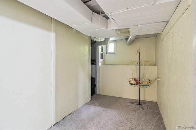 1295 S Downing St, Denver, CO 80210 - basement featuring carpet and a textured wall