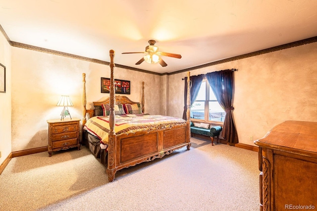 bedroom featuring baseboards, light carpet, a ceiling fan, and crown molding