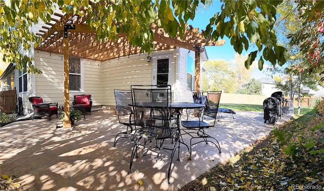 view of patio featuring a pergola