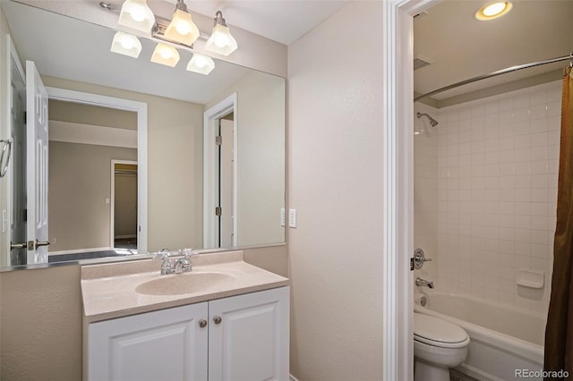 full bathroom with vanity, toilet, and shower / bath combo with shower curtain