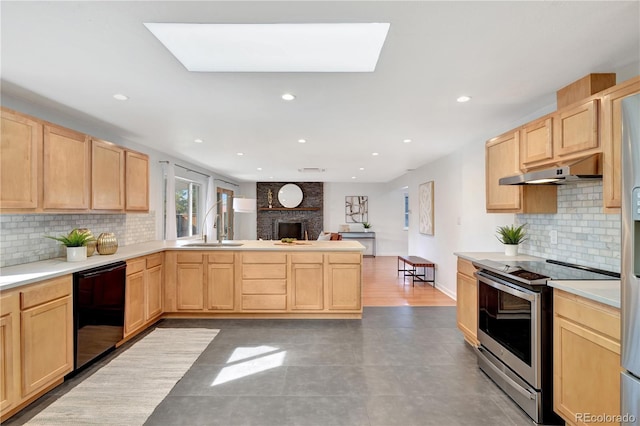 kitchen featuring under cabinet range hood, a sink, light countertops, electric stove, and light brown cabinetry