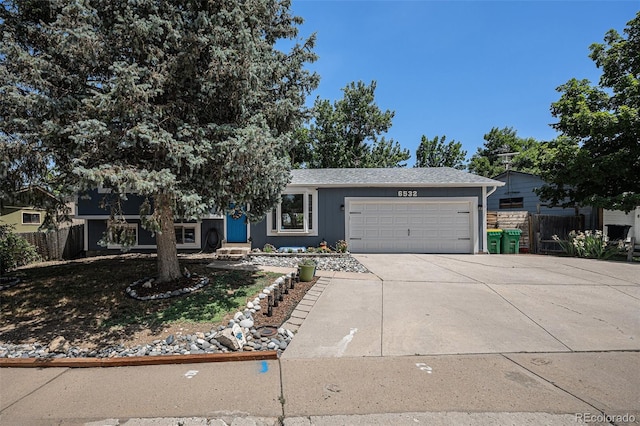 ranch-style house featuring a garage