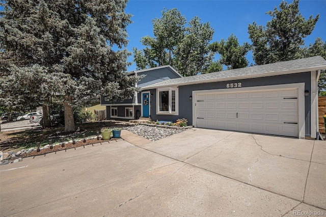 view of front of property featuring a garage