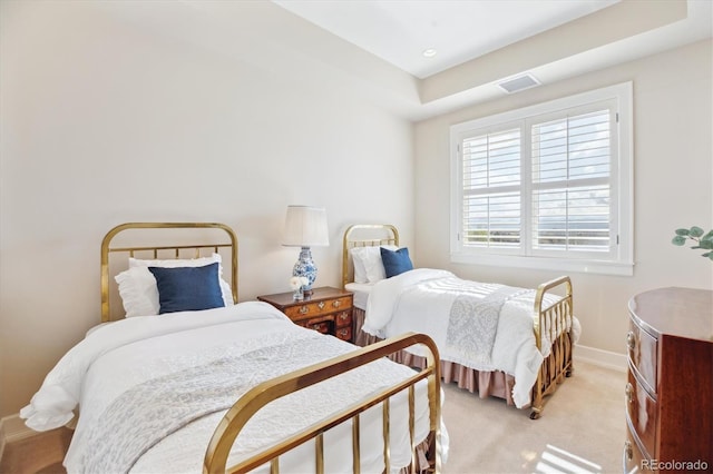 bedroom with light carpet, baseboards, and visible vents