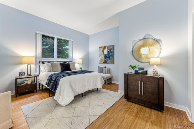 bedroom featuring hardwood / wood-style floors