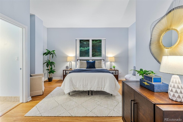 bedroom featuring light hardwood / wood-style floors