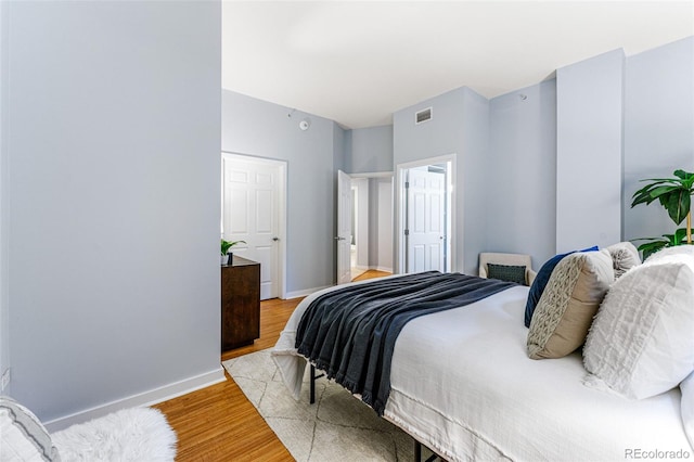 bedroom with light wood-type flooring