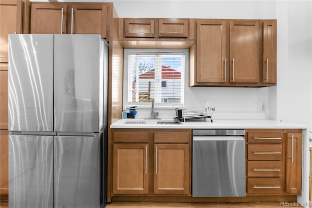 kitchen featuring appliances with stainless steel finishes and sink