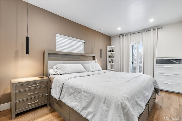 bedroom with light wood-type flooring