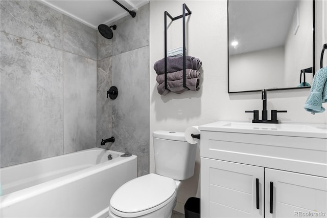 full bathroom featuring vanity, toilet, and tiled shower / bath