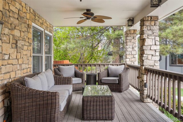 7836 S Fairfax Ct, Centennial, CO 80122 - wooden terrace featuring ceiling fan and an outdoor hangout area