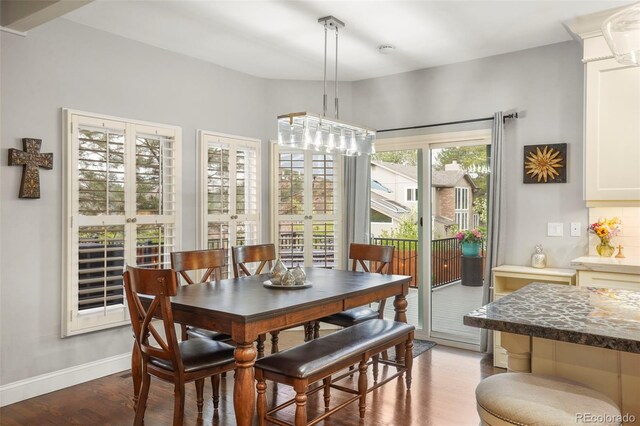 7836 S Fairfax Ct, Centennial, CO 80122 - dining space with baseboards and wood finished floors