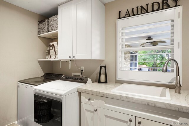 7836 S Fairfax Ct, Centennial, CO 80122 - washroom with a sink, cabinet space, and washer and dryer