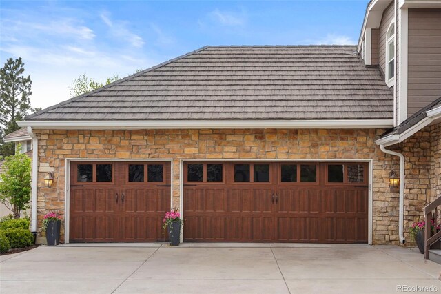 7836 S Fairfax Ct, Centennial, CO 80122 - garage with concrete driveway