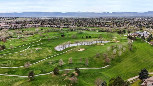 7836 S Fairfax Ct, Centennial, CO 80122 - birds eye view of property featuring a water and mountain view, view of golf course, and a residential view