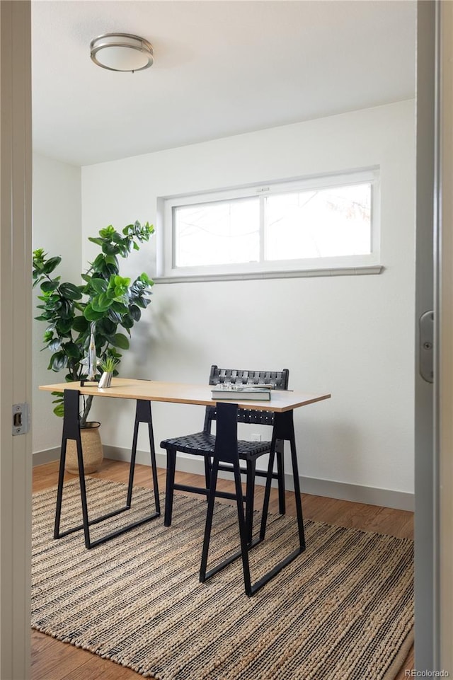 office area with wood-type flooring