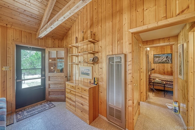 interior space featuring wood ceiling, wooden walls, and vaulted ceiling with beams