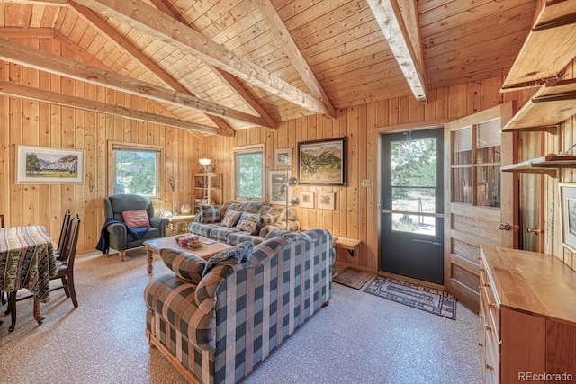 living room featuring light colored carpet, wooden walls, wooden ceiling, and lofted ceiling with beams