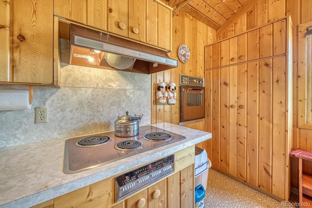 15270 Chimney Rock Rd, Nathrop, CO 81236 - kitchen featuring under cabinet range hood, electric stovetop, oven, wood ceiling, and lofted ceiling