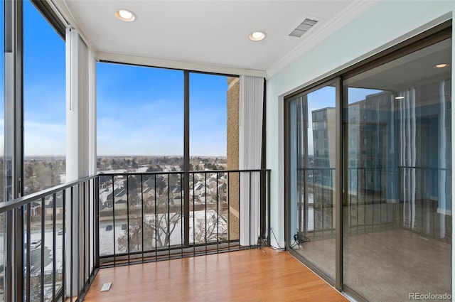 unfurnished sunroom with plenty of natural light