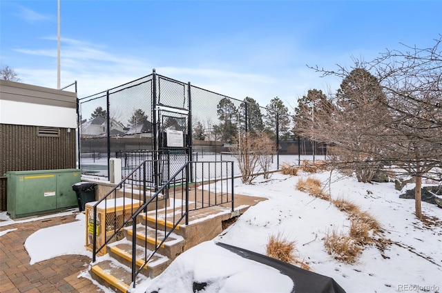 view of yard layered in snow