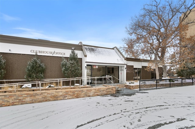 view of snow covered property