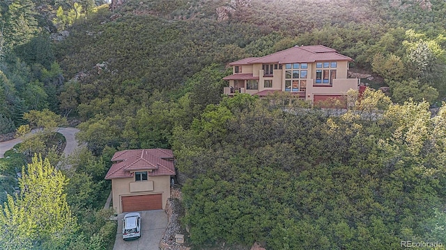 aerial view with a wooded view