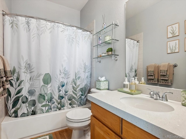 full bathroom with wood-type flooring, vanity, toilet, and shower / bath combo