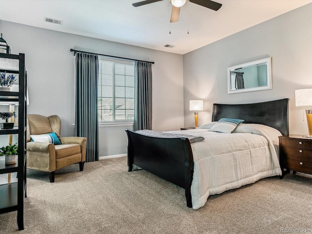 bedroom featuring ceiling fan and light colored carpet