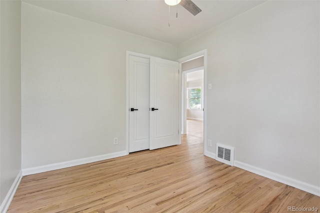 2709 S Franklin St, Denver, CO 80210 - empty room featuring a ceiling fan and light wood finished floors