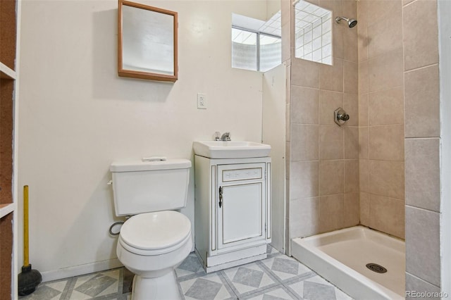2709 S Franklin St, Denver, CO 80210 - full bathroom with vanity and tiled shower