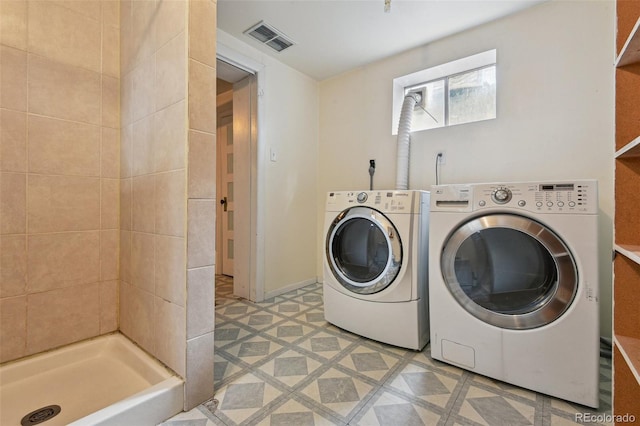 2709 S Franklin St, Denver, CO 80210 - washroom featuring washer and clothes dryer