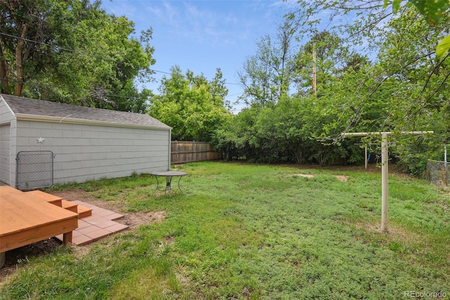2709 S Franklin St, Denver, CO 80210 - fenced backyard featuring a wooden deck