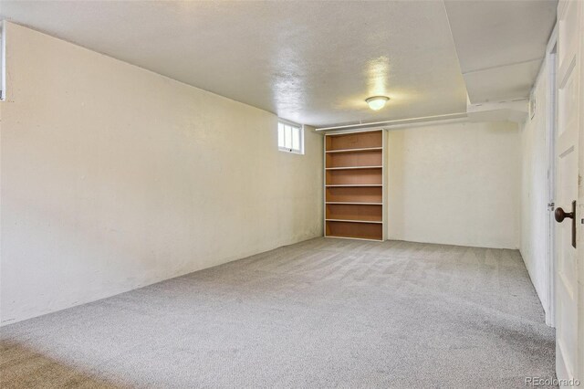 2709 S Franklin St, Denver, CO 80210 - below grade area featuring light colored carpet