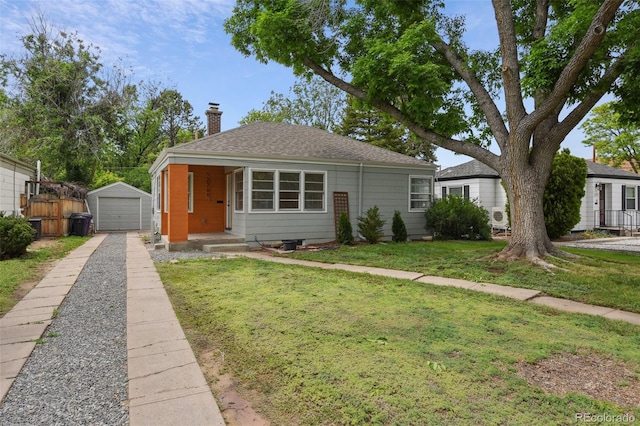 2709 S Franklin St, Denver, CO 80210 - bungalow-style house featuring an outdoor structure, driveway, a detached garage, a chimney, and roof with shingles