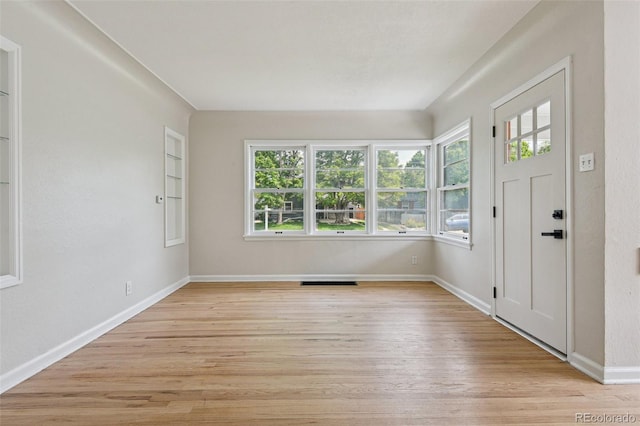 2709 S Franklin St, Denver, CO 80210 - entrance foyer featuring light wood-type flooring and baseboards