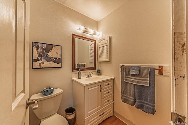 7945 York St Unit 2, Denver, CO 80229 - bathroom featuring vanity and wood finished floors